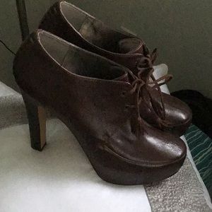 Brown leather high heel shoes